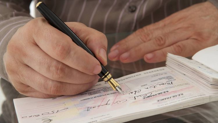 « Puis-je signer un chèque de 9 000 euros ? »
